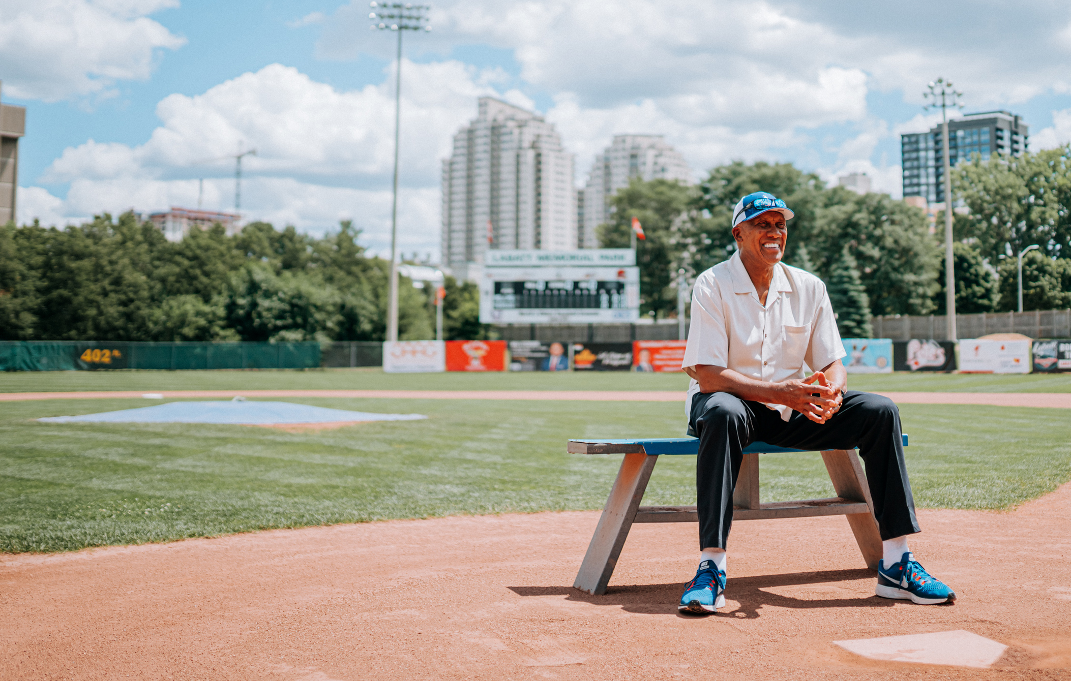 Fergie Jenkins sitting on a bench