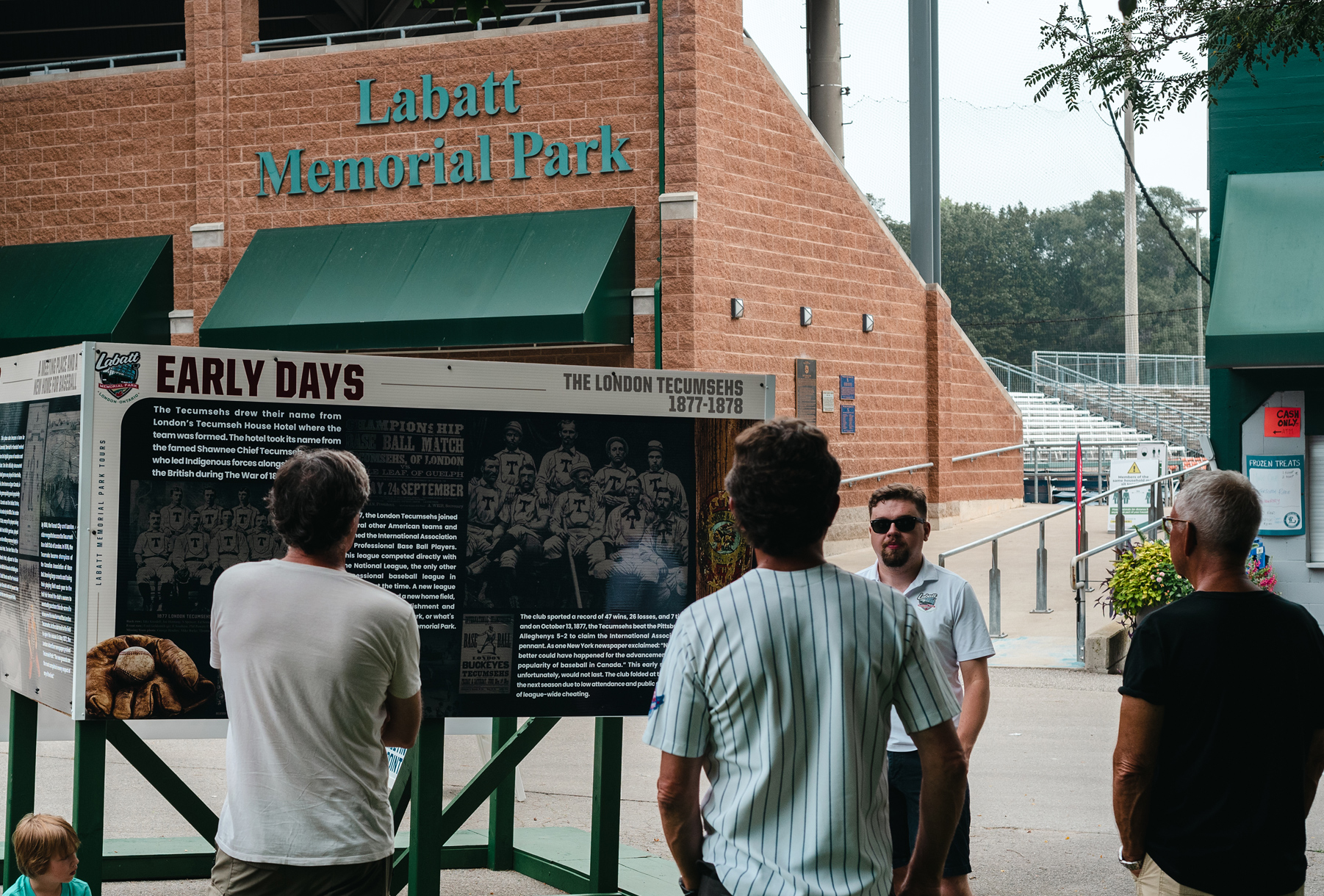 a collage of photos showing baseball players and Labatt Memorial Park